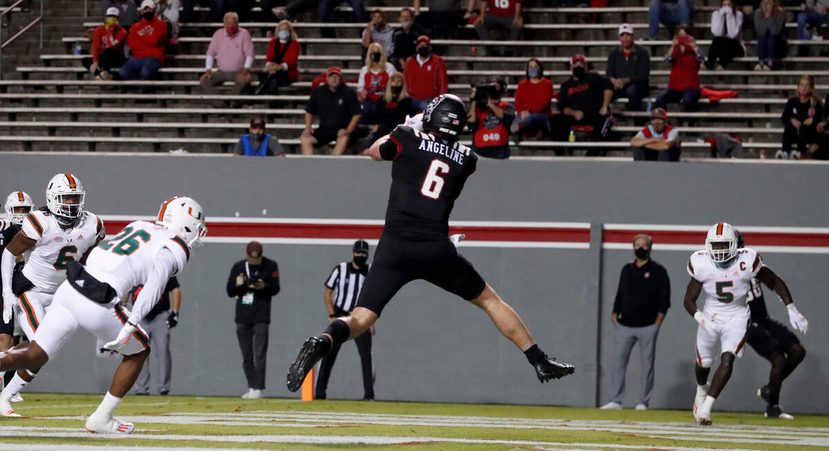 N.C. State tight end Cary Angeline (6) pulls in a nine-yard touchdown reception during the first half of N.C. State’s game against Miami at Carter-Finley Stadium in Raleigh, N.C., Friday, Nov. 6, 2020.