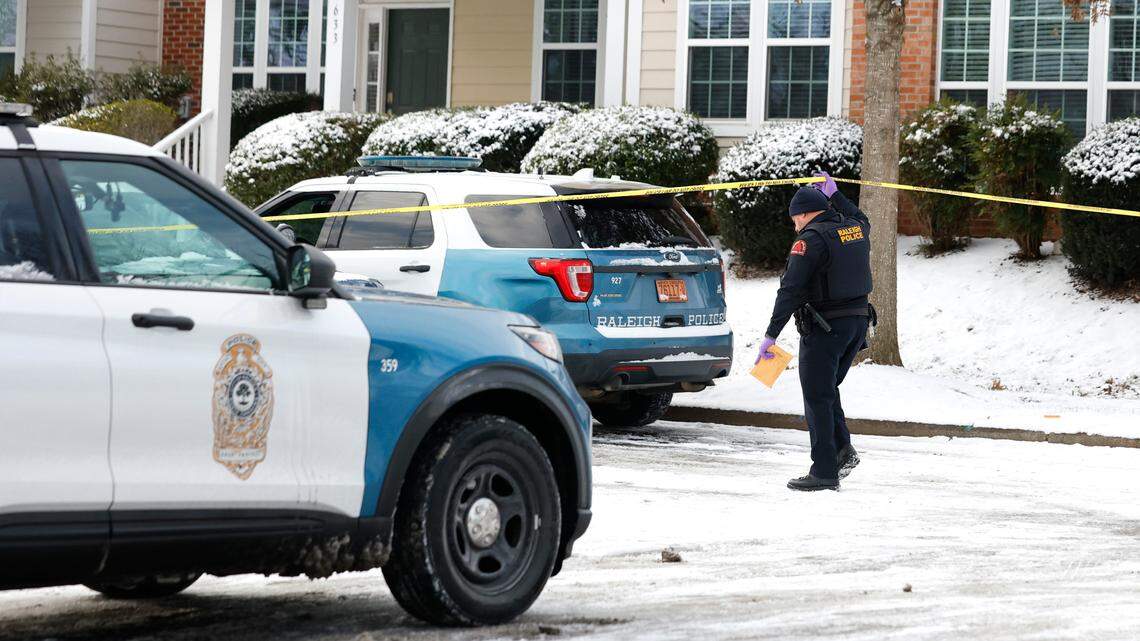 Raleigh police work outside a home Democracy Street in Raleigh, N.C., on Wednesday morning, Jan. 22, 2025.