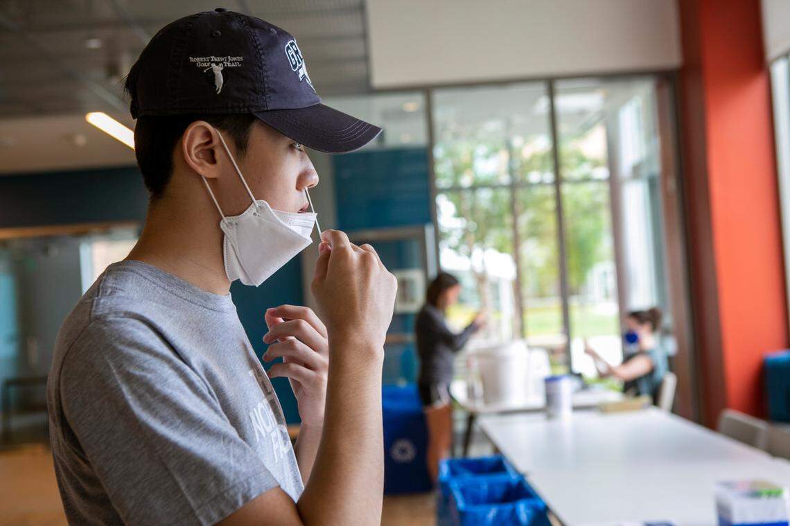 Duke University has launched COVID-19 surveillance testing on random students at multiple testing sites across East and West Campus, including here at The Hollows residence hall. Here, sophomore Donghan Park self administers a nose swab test.