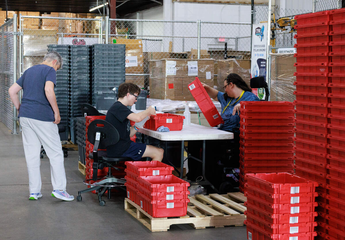 Amy Moore, Hunter Potter and Heather McYoung work at Gabi’s PALS (Packaging, Assembling, Labeling and Shipping) on Monday, June 24, 2025, in Raleigh, N.C.
