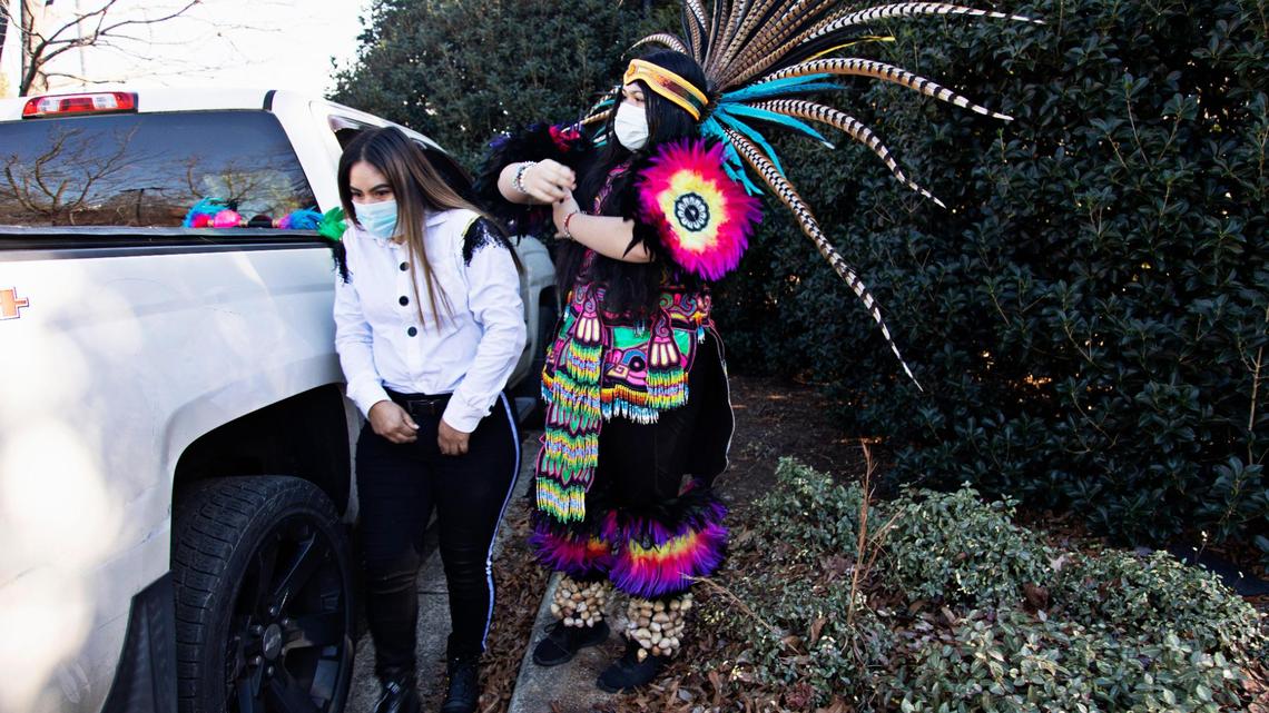 Karla Alvarado, right, 14, from Wake Forest, prepares to dance with Danza de Rayados in the Desfile del Dia de Reyes or Three Kings’ Day Parade in Cary on Saturday, Jan. 8, 2022. Cary is forming a new Human Relations, Inclusion & Diversity Task Force to assess and build relationships with “under-served and underrepresented citizens, visitors and businesses” among other goals.