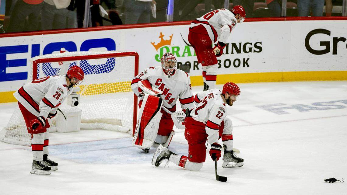 The Carolina Hurricanes Sebastian Aho (20), Frederik Andersen (31), Brett Pesce (22) and Brady Skjei (76) react after the Florida Panthers Matthew Tkachuk (19) scored the game winning goal with five seconds to play in the third period to secure a 4-3 victory and clinch the Eastern Conference Finals on Wednesday, May 24, 2023 at FLA Live Arena in Sunrise, Fla.