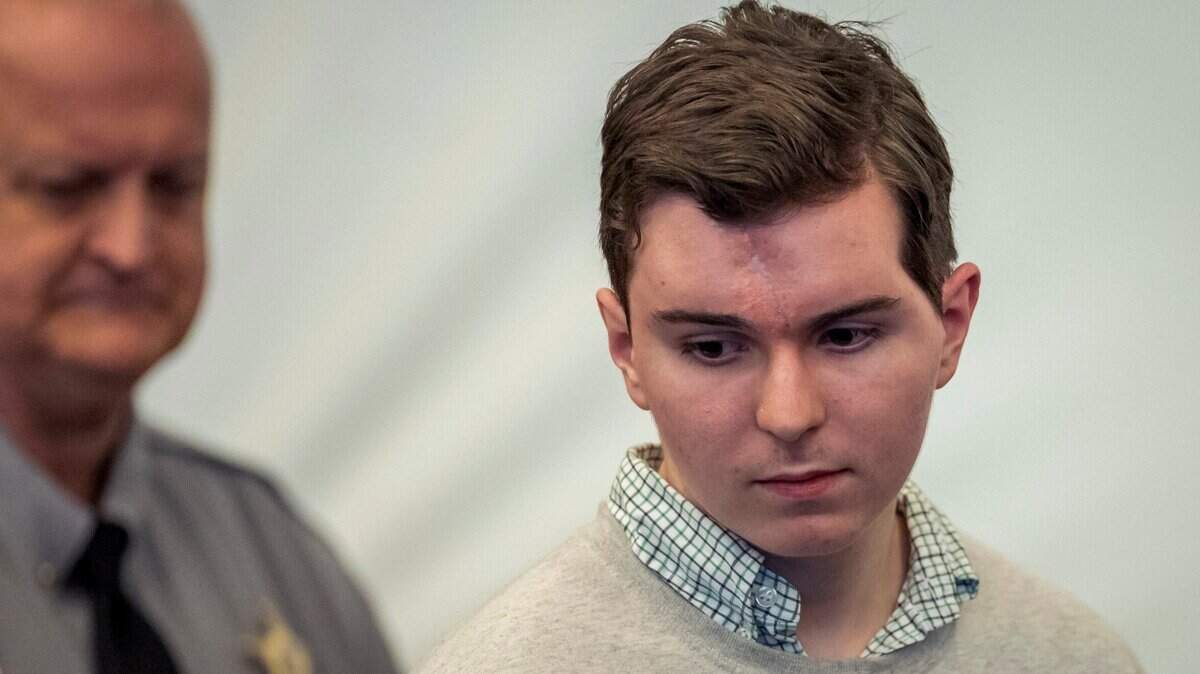 Austin Thompson arrives for his first court appearance on Friday, January 10, 2025 at the Wake County Justice Center in Raleigh, N.C. Thompson is accused in the deadly 2022 shootings in Raleigh’s Hedingham neighborhood.