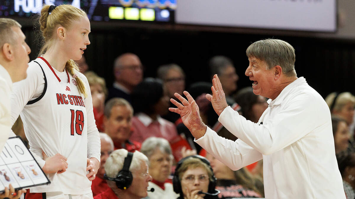 N.C. State head coach Wes Moore speaks with Tilda Trygger during the second half of the Wolfpack’s 83-67 win over Pittsburgh on Thursday, Jan. 16, 2025, at Reynolds Coliseum in Raleigh, N.C.