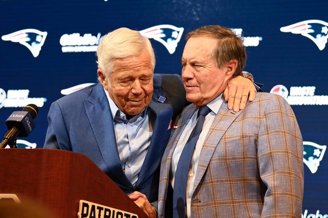 New England Patriots former head coach Bill Belichick embraces Patriots owner Robert Kraft during a press conference at Gillette Stadium to announce Belichick’s exit from the team in Jan. 2024.