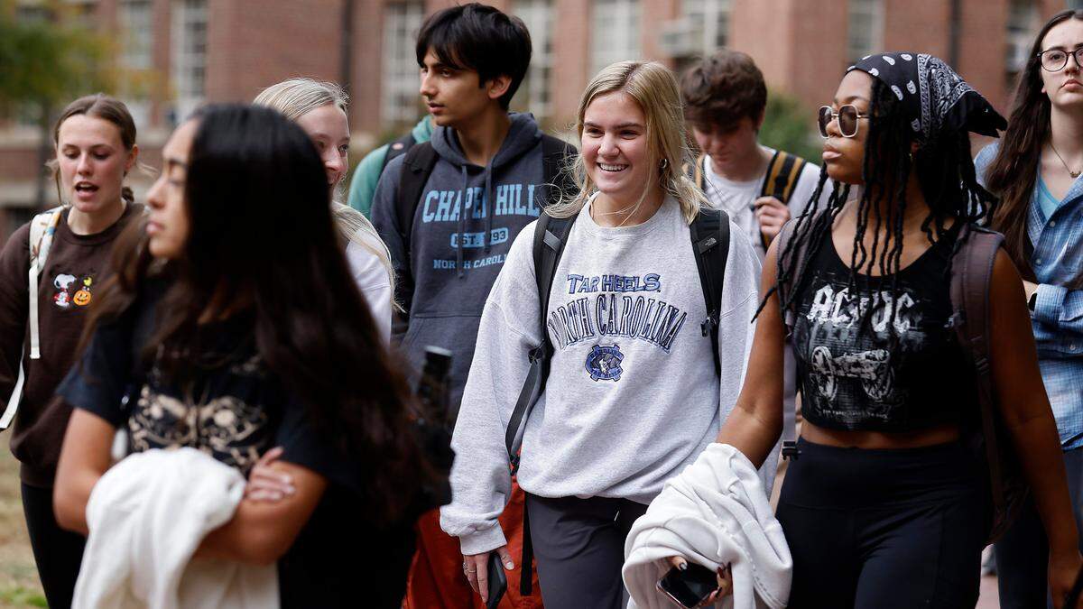 People walk through the campus of UNC-Chapel Hill on Monday, Oct. 31, 2022, in Chapel Hill, N.C. The U.S. Supreme Court on Monday will hear oral arguments in Students for Fair Admissions v. University of North Carolina, a case regarding race-conscious admission practices at institutions of higher education.