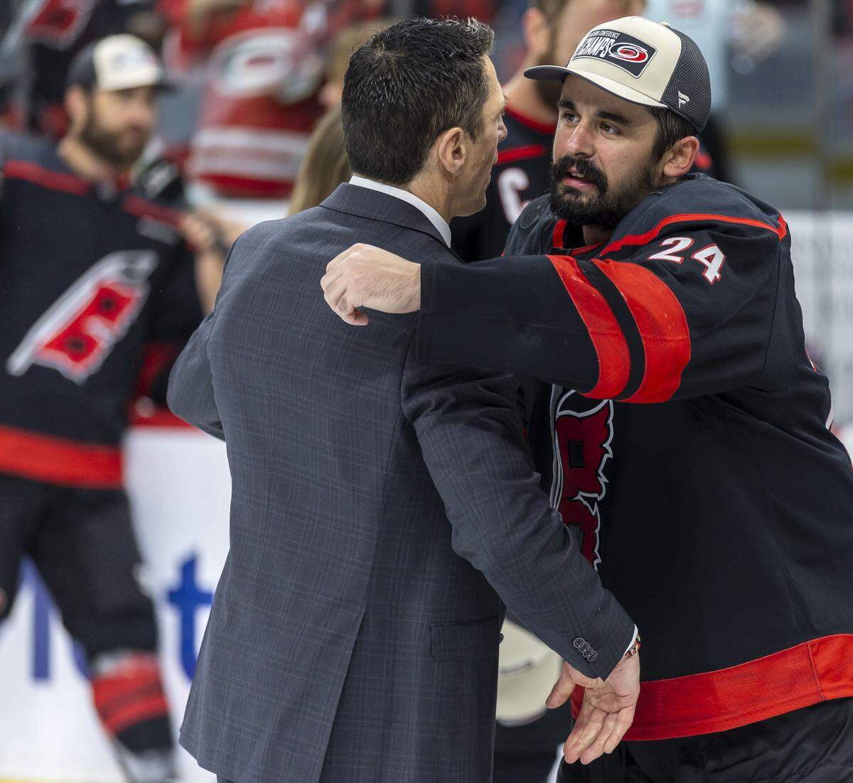 Carolina Hurricanes head coach Rod Brind’Amour embraces center Seth Jarvis (24) following their 6-1 victory over Montreal, clinching the Eastern Conference, and advancing to the Stanley Cup Finals on Friday, May 29, 2026 at Lenovo Center in Raleigh, N.C.