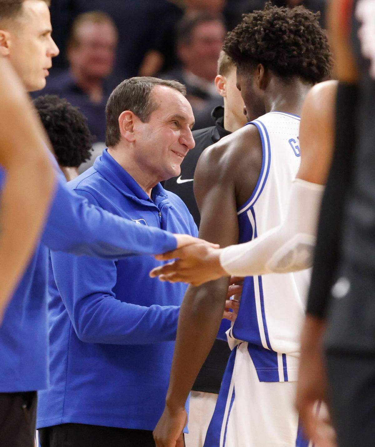 Duke head coach Mike Krzyzewski talks with AJ Griffin (21) during the first half of Dukes game against Texas Tech in the Sweet 16 round of the NCAA Tournament at the Chase Center in San Francisco, Calif., Thursday, March 24, 2022.