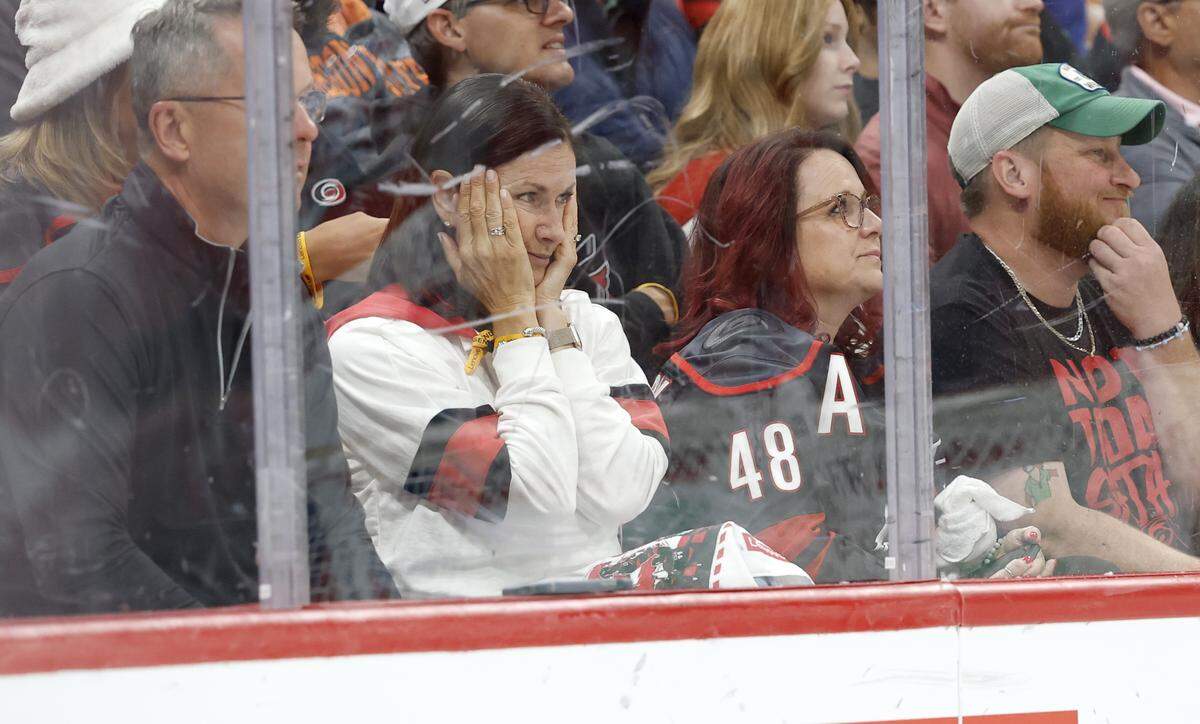 Fans react after Montreal scored in the first period of the Hurricanes’ game against the Canadiens in game one of the Eastern Conference Finals at the Lenovo Center Thursday, May, 21, 2026.