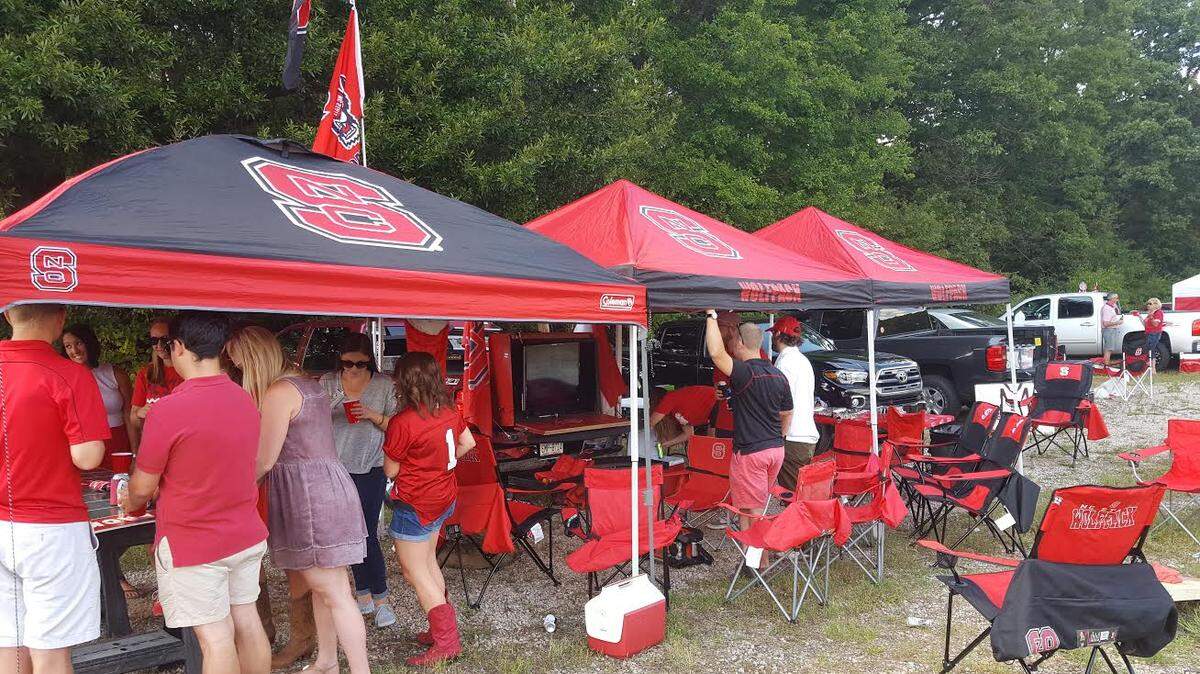 The ability to spread out near trees and put tents and tailgates together made the Trinity parking lot a popular spot for N.C. State fans. A Georgia-based developer submitted preliminary plans to the city in January that show a large apartment project planned for the lot.