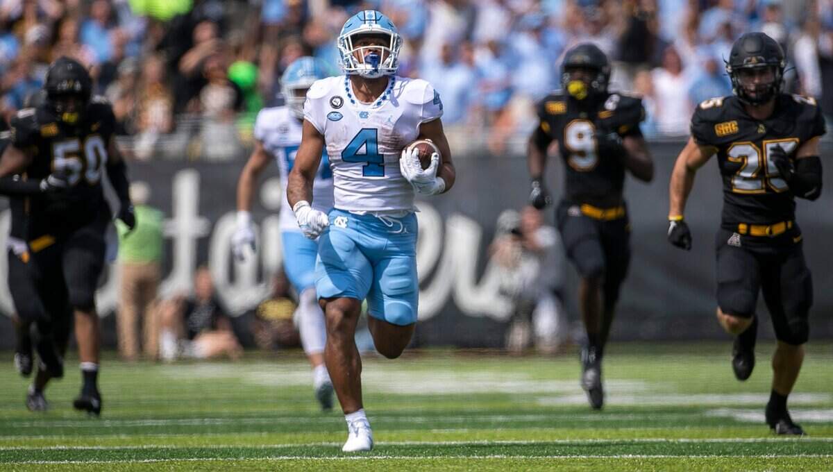 North Carolinas Caleb Hood (4) breaks open for a 71-yard run in the fourth quarter on Saturday, September 3, 2022 at Kidd Brewer Stadium in Boone, N.C.