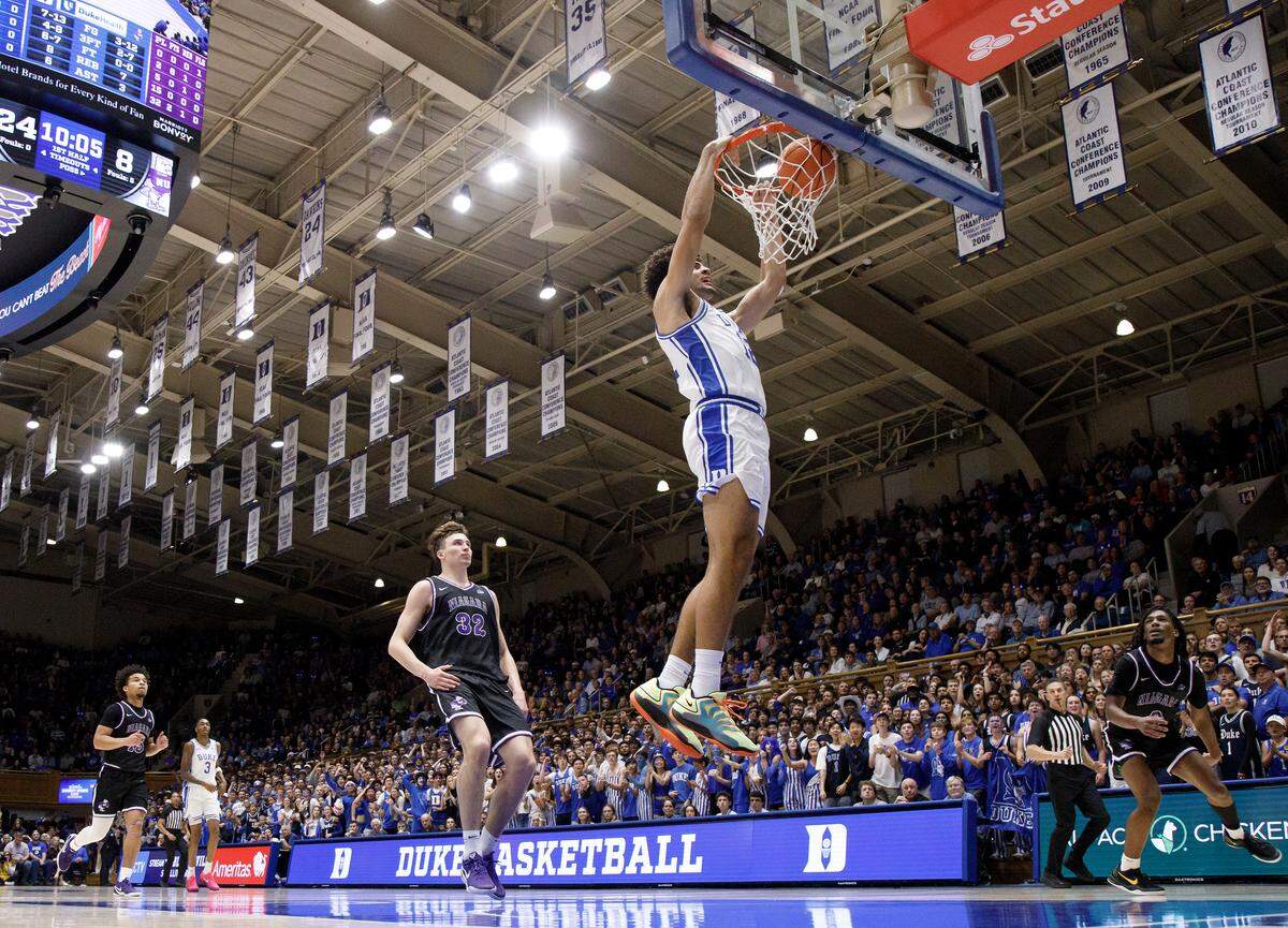 Duke’s Cameron Boozer slams in two during the first half of the Blue Devils’ 100-42 win over Niagara on Friday, Nov. 21, 2025, at Cameron Indoor Stadium in Durham, N.C.