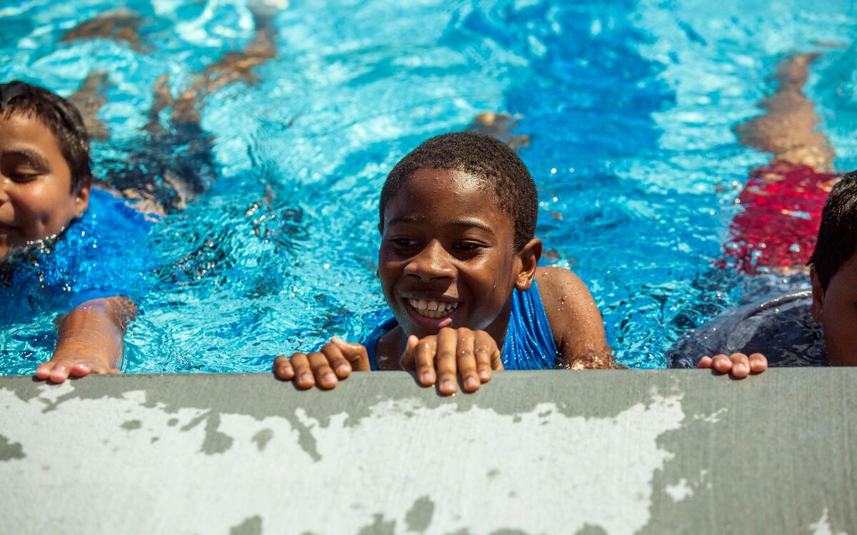 Chidera Nwokediki, 11, practices kicking during a swim lesson with fellow 5th grade students taught by YMCA swim instructors at Southeast Raleigh Elementary School on Wednesday, Sep. 18, 2019, in Raleigh, NC. The school opened in August and features a wide range of partnerships, including the YMCA facilities.