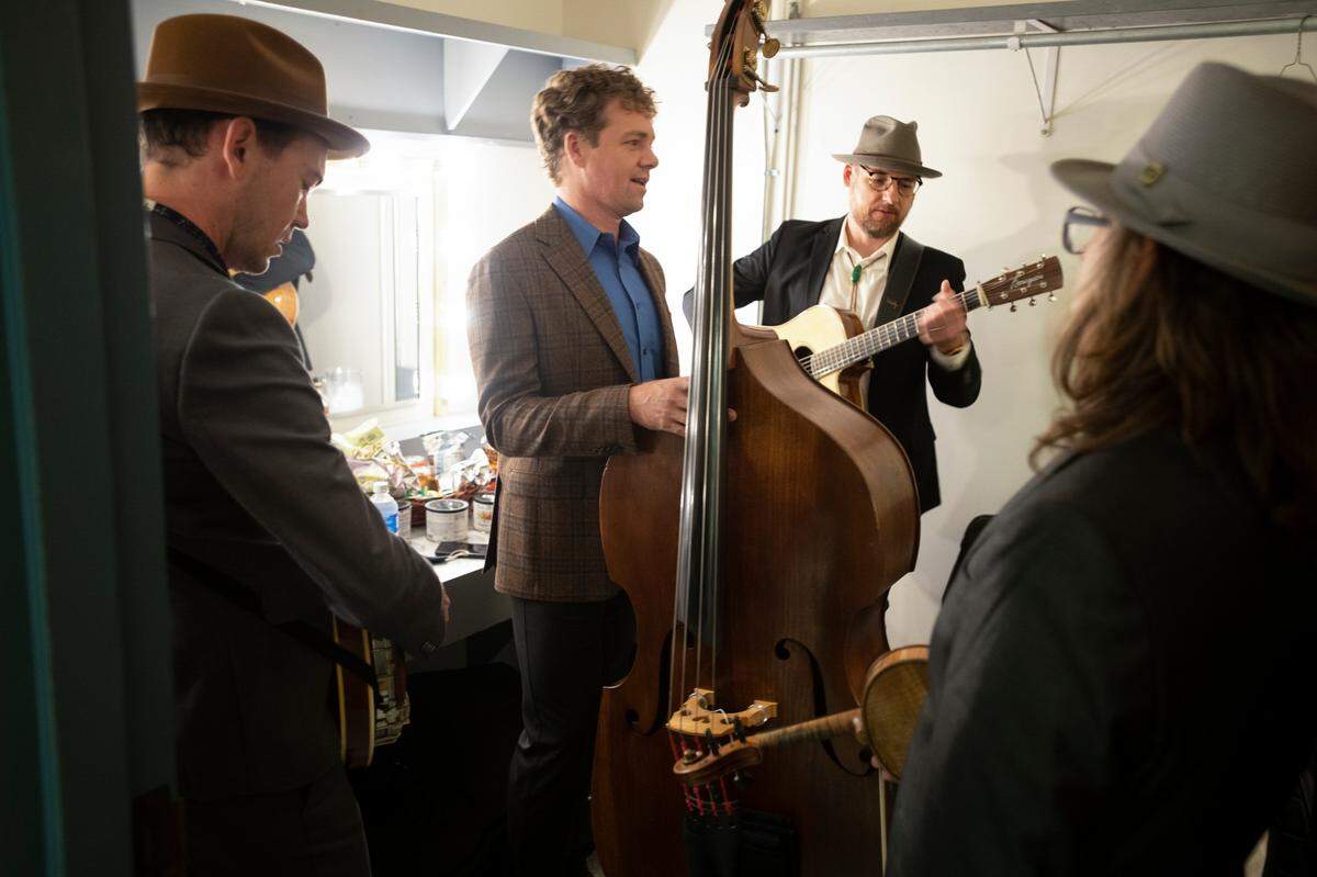 The Infamous Stringdusters warm up before performing at, and hosting the 32nd Annual IBMA Bluegrass Music Awards in Raleigh, N.C., Thursday night, Sept. 30, 2021.