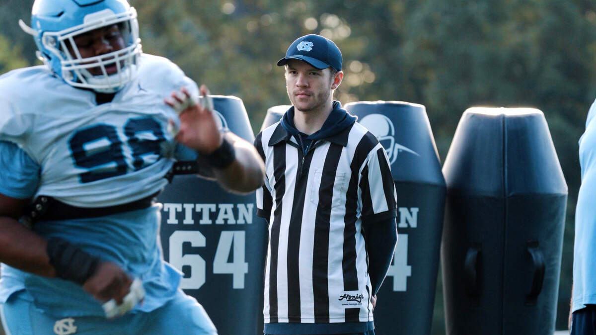 UNC student equipment manager Camden Bailey has a prosthetic left leg because of cancer.