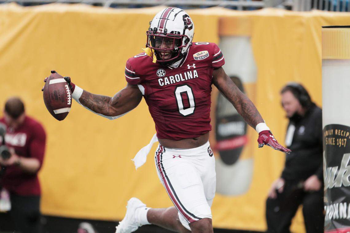South Carolina Gamecocks tight end Jaheim Bell (0) celebrates scoring his second touchdown against North Carolina at the Duke’s Mayo Bowl at Bank of America Stadium in Charlotte, North Carolina on Thursday, December 30, 2021.