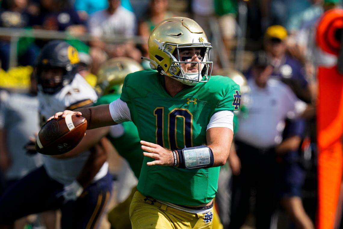 Notre Dame quarterback Drew Pyne (10) throws against California during the first half of an NCAA college football game in South Bend, Ind., Saturday, Sept. 17, 2022. (AP Photo/Michael Conroy)