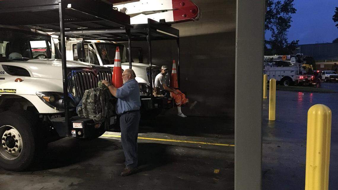 Fayetteville Public Works Commission employees work on restoring power after Hurricane Florence in 2018.
