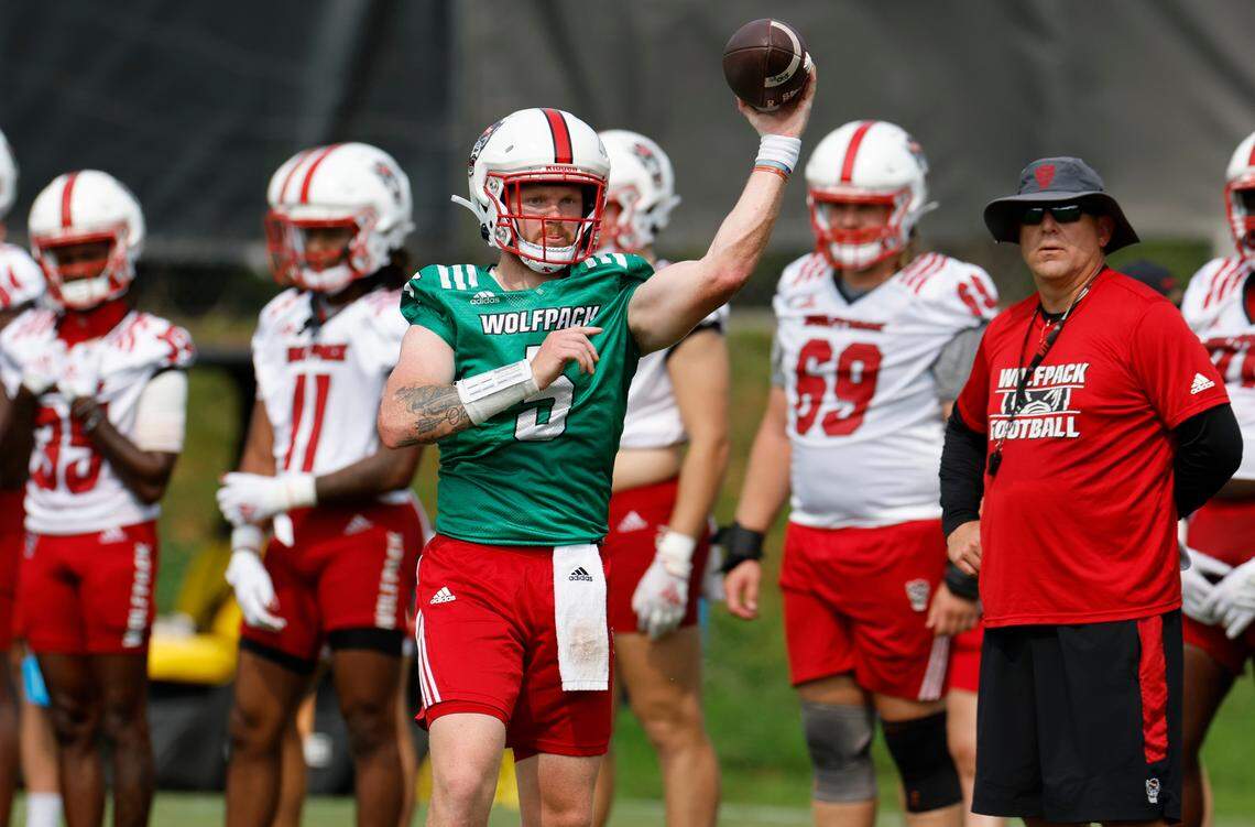 N.C. State quarterback Brennan Armstrong (5) passes during the Wolfpack’s first fall practice in Raleigh, N.C., Wednesday, August 2, 2023.