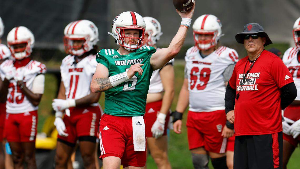 N.C. State quarterback Brennan Armstrong (5) passes during the Wolfpack’s first fall practice in Raleigh, N.C., Wednesday, August 2, 2023.