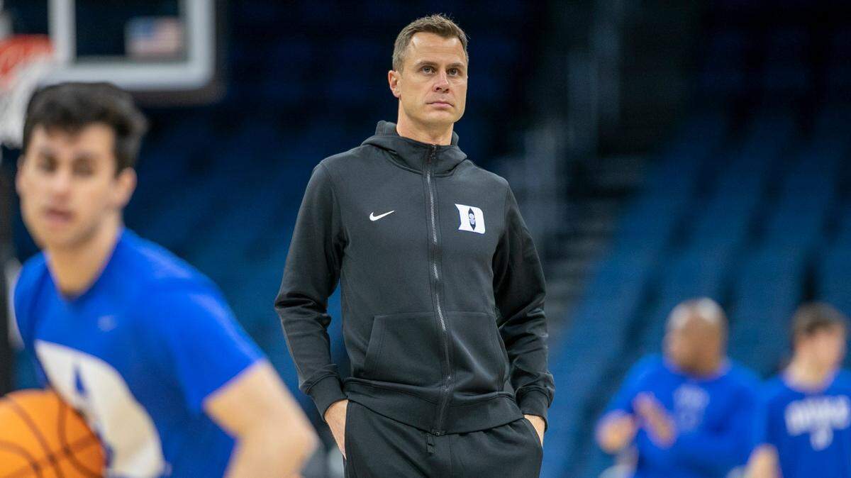 Duke head coach Jon Scheyer watches the Blue Devils’ practice on Wednesday, March 15, 2023 at the Amway Center in Orlando, Fla.