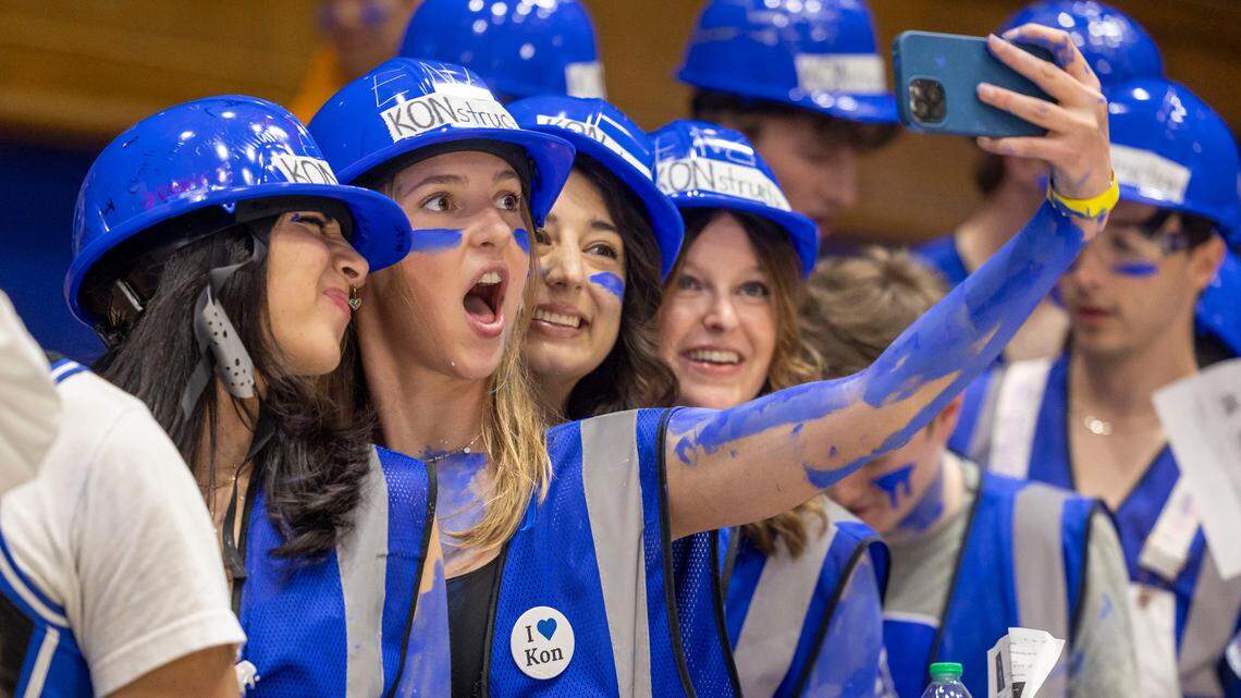 Duke student Katherine Gallagher captures a photograph of herself with her fellow ‘Cameron Crazies’ as they were among the first to enter Cameron Indoor Stadium for the Blue Devils’ game against North Carolina on Saturday, February 1, 2025 in Durham, N.C.