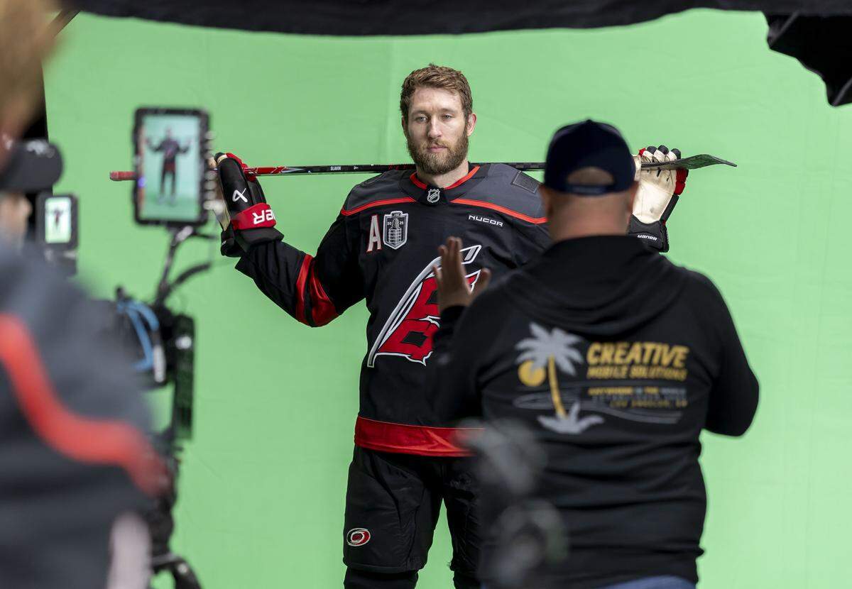 Carolina Hurricanes defenseman Jacoob Slavin (74) poses during a video shoot following practice, ahead of Game 1 of the Stanley Cup Finals, on Monday, June 1, 2026 at Lenovo Center in Raleigh, N.C.  