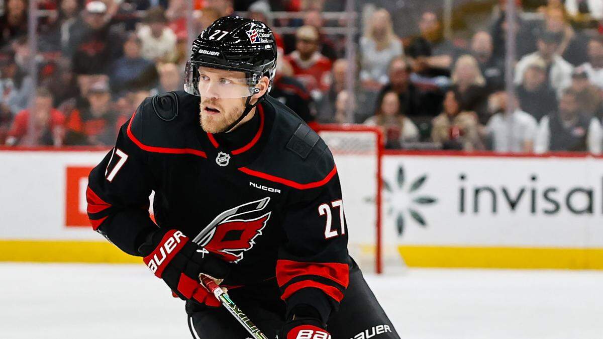 RALEIGH, NORTH CAROLINA - OCTOBER 28: Nikolaj Ehlers #27 of the Carolina Hurricanes skies with the puck during the second period of the game against the Vegas Golden Knights at the Lenovo Center on October 28, 2025 in Raleigh, North Carolina. (Photo by Jaylynn Nash/Getty Images)