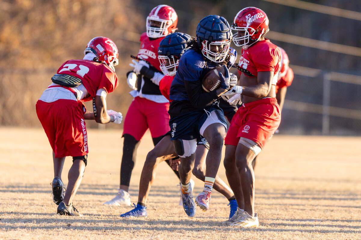 The Louisburg College Football team holds their final practice on Tuesday, Dec. 3, 2004, in Louisburg. The team is heading to the NJCAA National Championship for the first time in the program’s 20-year history.
