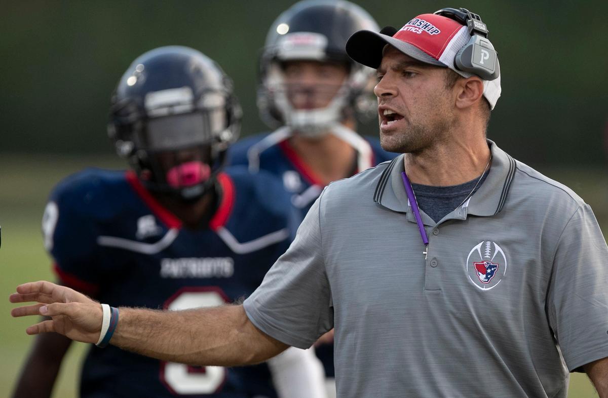 Apex Friendship coach Adam Sanders directs his team during their game against Middle Creek on Monday, September 30, 2019 in Apex, N.C.