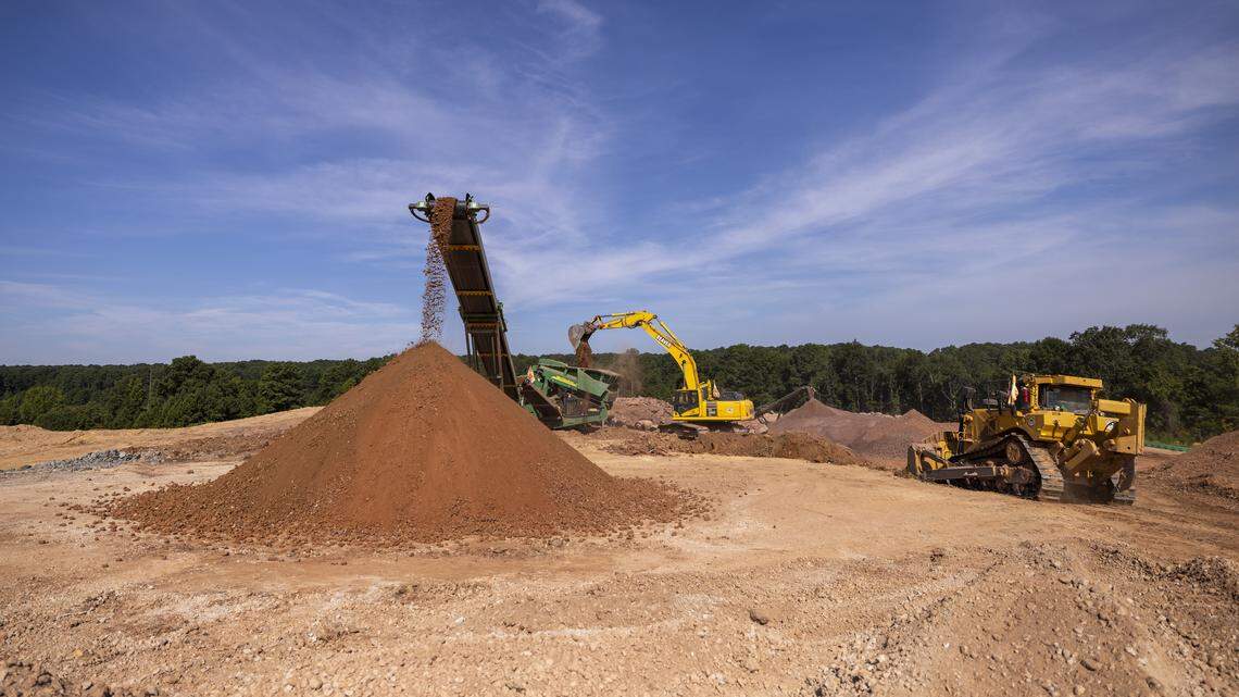 Before it can be moved to the runway site at Raleigh-Durham International Airport, earth and stone is crushed and screened to meet size specifications set by the Federal Aviation Administration.