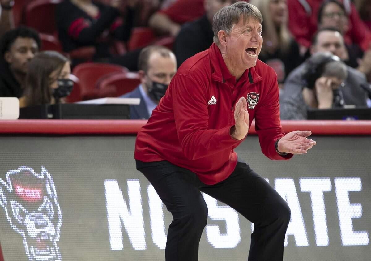 N.C. State coach Wes Moore applauds his teams performance in the second half against Kansas State during the second round of the NCAA Tournament on Monday, March 21, 2022 at Reynolds Coliseum in Raleigh, N.C.