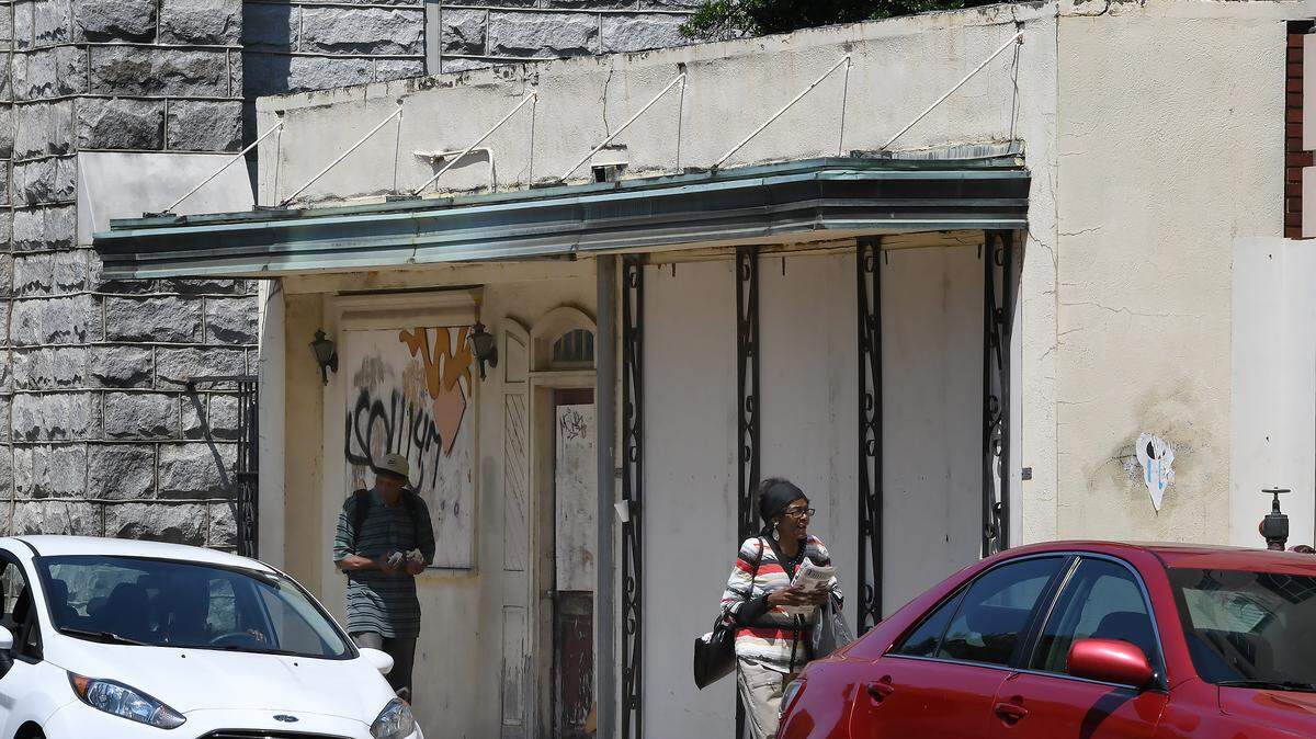 A one-story, boarded-up storefront sits directly behind the old Revenue Building on West Morgan Street in downtown Raleigh, NC, in this photo taken Wednesday, August 15, 2018.