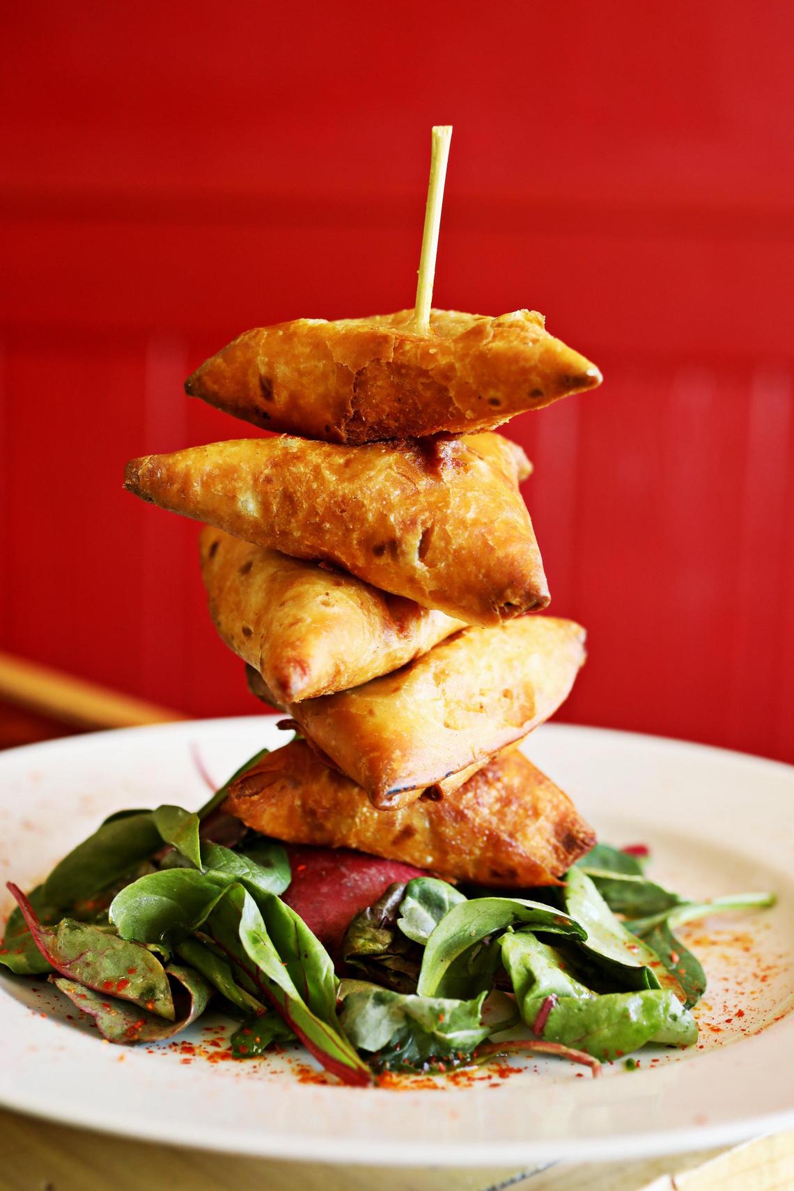 Zweli’s crispy,spice-fragrant beef samosas are a legacy of Zimbabwe’s immigrant Indian community.