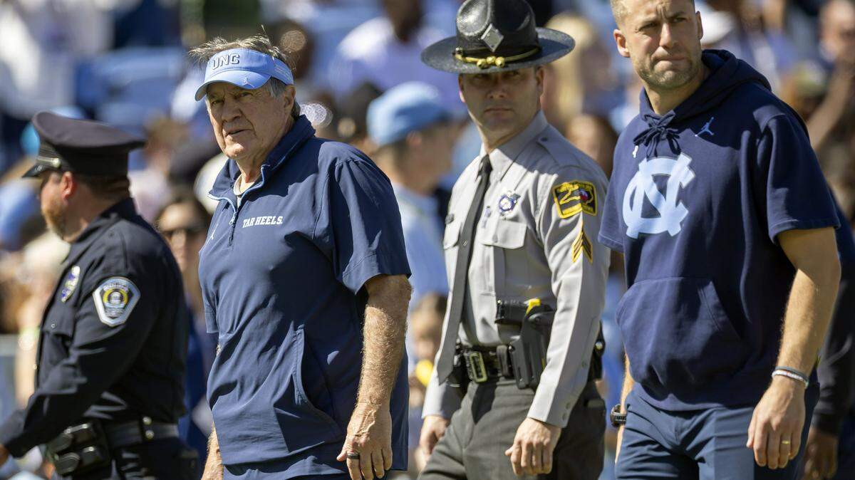 North Carolina coach Bill Belichick enters the field for the Tar Heels’ game against Clemson on Saturday, October 4, 2025 at Kenan Stadium in Chapel Hill, N.C.