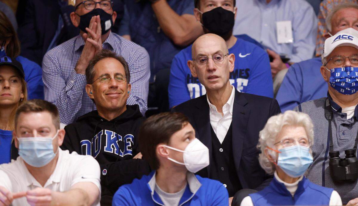 Jerry Seinfeld and Commissioner of the NBA Adam Silver watch during Duke’s game against UNC at Cameron Indoor Stadium in Durham, N.C., Saturday, March 5, 2022.