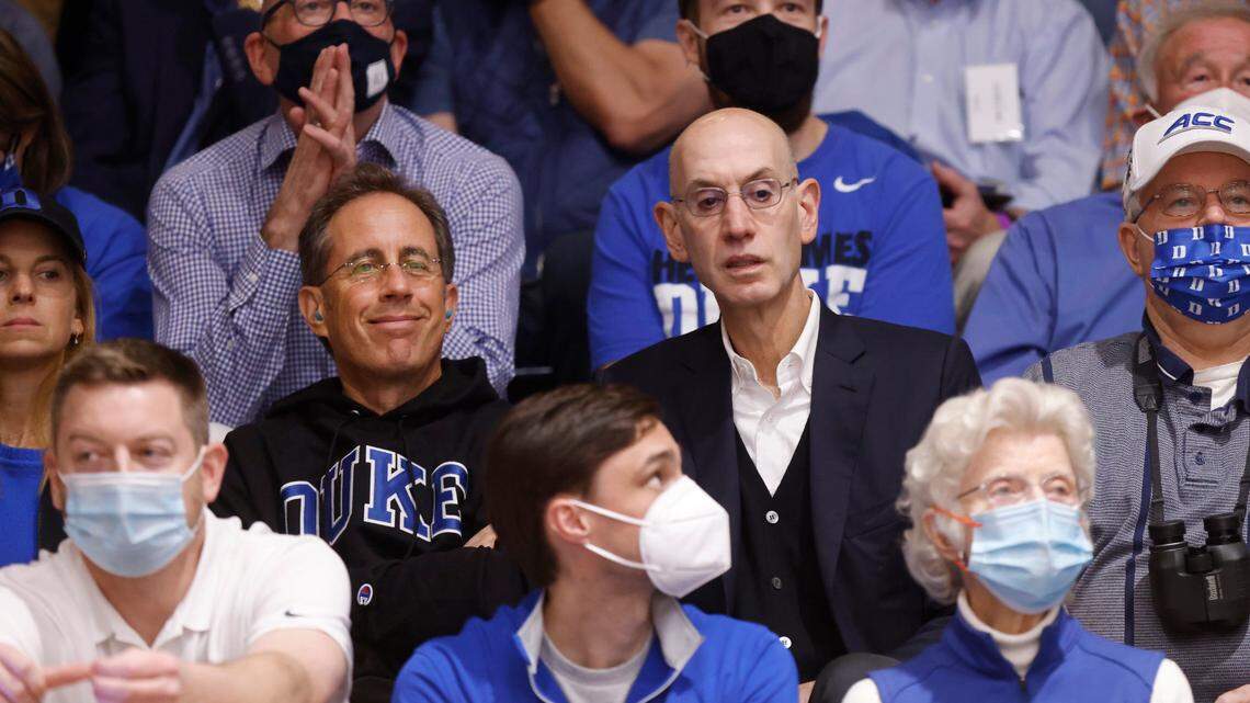 Jerry Seinfeld and Commissioner of the NBA Adam Silver watch during Duke’s game against UNC at Cameron Indoor Stadium in Durham, N.C., Saturday, March 5, 2022.