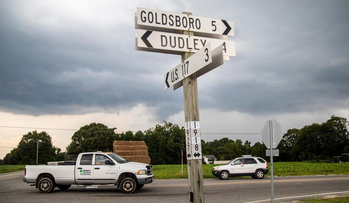 Vehicles drive through a crossroads near the unincorporated community of Dudley, NC on Monday August 10, 2020. The majority minority 28333 zip code, which includes Dudley, has a coronavirus infection rate higher than the Wayne county average and has one of the largest changes in infection rates during the period from May 22 to July 13.