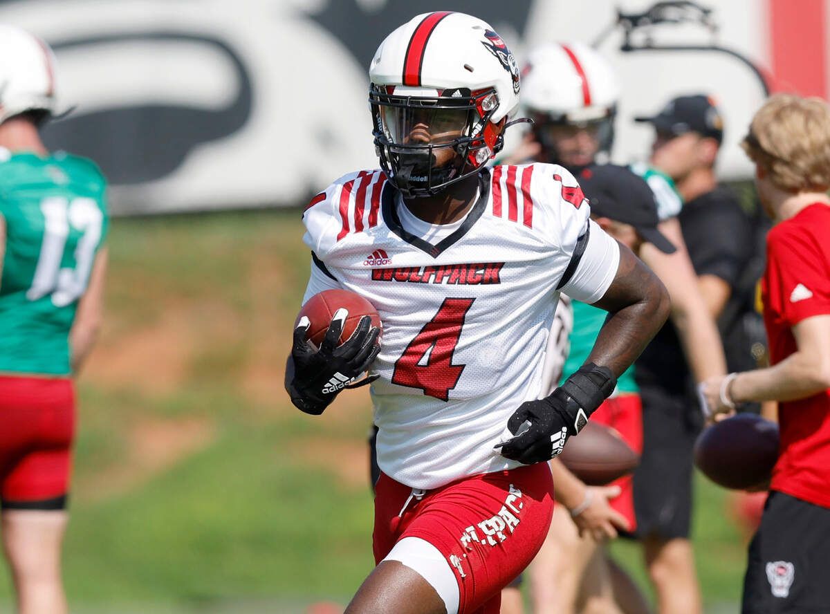 N.C. State wide receiver Porter Rooks (4) runs downfield during the Wolfpack’s first practice of fall camp in Raleigh, N.C., Wednesday, August 3, 2022.
