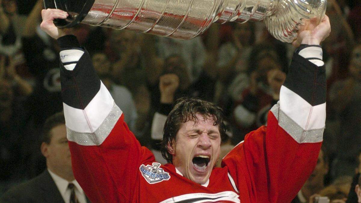 Hurricanes captain Rod Brind’Amour accept the Stanley Cup trophy after Carolina’s 3-1 win over Edmonton in game 7 of the Stanley Cup Final Wednesday, June 14, 2006 at the RBC Center.