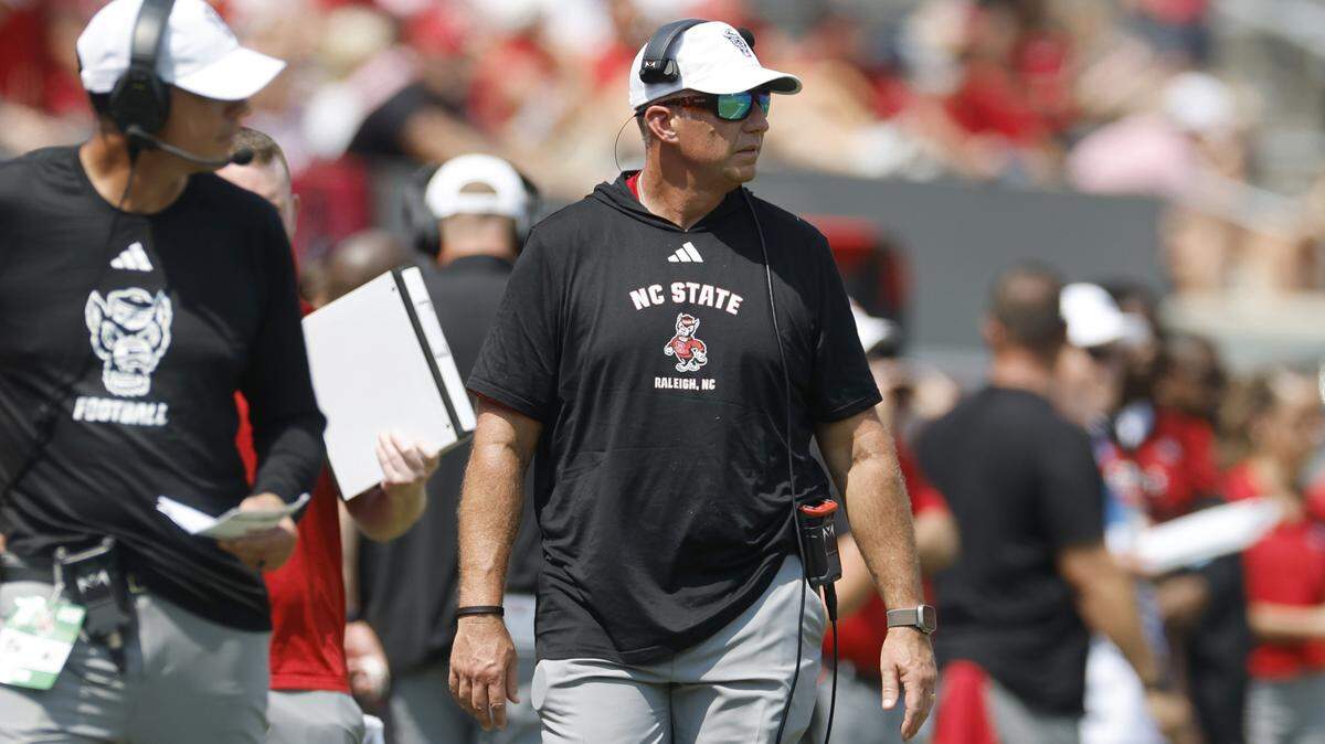 N.C. State head coach Dave Doeren walks the sidelines during the first half of N.C. State’s game against Virginia at Carter-Finley Stadium in Raleigh, N.C., Sat. Sept. 6, 2025.