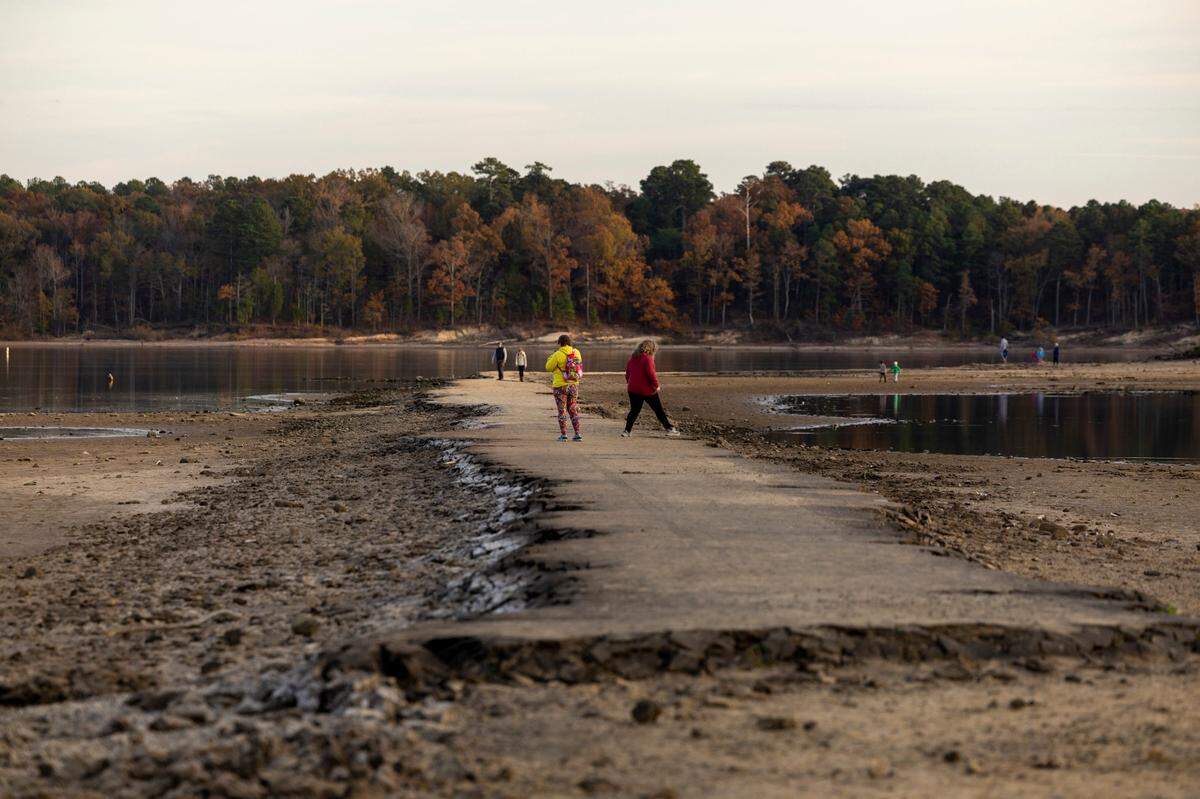 An old roadbed that was part of a community in New Hope Valley before it was flooded upon Jordan Lake’s 1982 completion is visible Tuesday, Nov. 15, 2023 in Chapel Hill. Jordan Lake is more than four feet below the lake’s 216.08 median water depth over the past 29 years, and about 2.5 feet below the lake’s height last year.