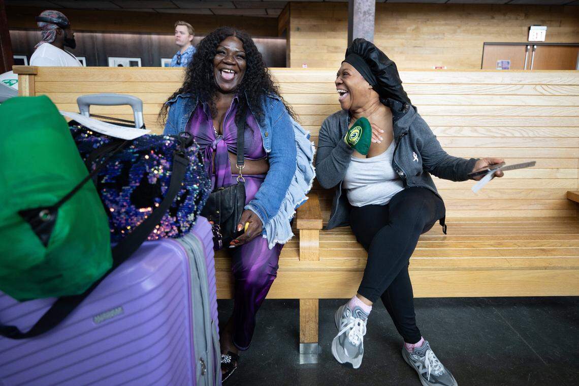 Donna Williams, left, and Monique Williams, right, share a laugh at Union Station in Raleigh after their northbound Amtrak train was cancelled for the second day in a row on Tuesday, July 11, 2023. The two didn’t know each other before their trip, but after an engine failure on July 10 canceled their original train to northern Virginia, and a derailment canceled their new train on July 11 — the two plan to keep in touch. Both are missing work due to the cancellations. “I can’t deal with this a third day,” Donna said.