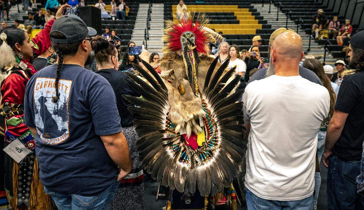 Spectators watch the drum circle competition at the Bravenation Powwow and Gathering at Pembroke at UNC-Pembroke, Saturday, March 23, 2025.