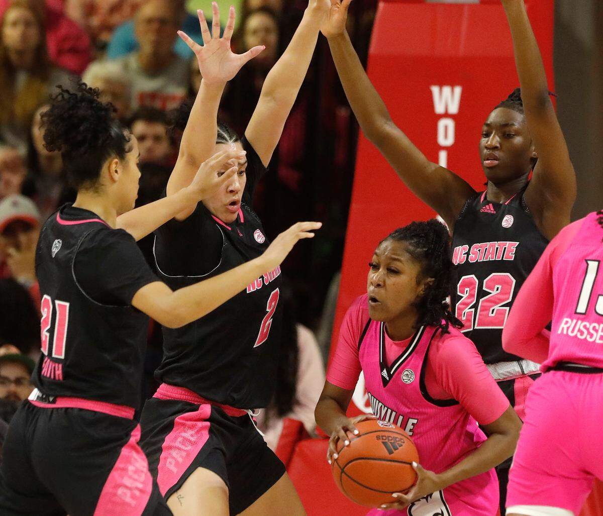 N.C. State’s Madison Hayes, Mimi Collins and Saniya Rivers pressure Louisville’s Kiki Jefferson during the first half of the Wolfpack’s 77-67 win on Monday, Feb. 5, 2024, at Reynolds Coliseum in Raleigh, N.C.