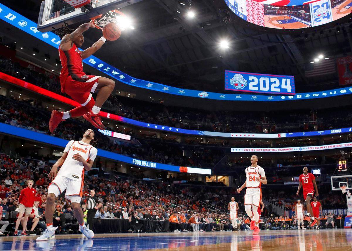 N.C. State’s DJ Horne (0) slams in two during N.C. State’s 83-65 victory over Syracuse in the second round of the 2024 ACC Men’s Basketball Tournament at Capital One Arena in Washington, D.C., Wednesday, March 13, 2024.