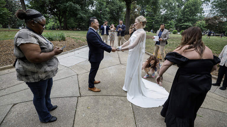 The weddings that wouldn’t wait — even with Wake’s courthouse closed by chaos