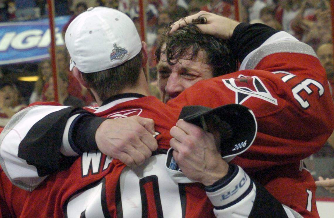 Cam Ward, left, and Rod Brind'Amour embrace after the Carolina Hurricanes beat the Edmonton Oilers in Game 7 of the 2006 Stanley Cup at the RBC Center in Raleigh.