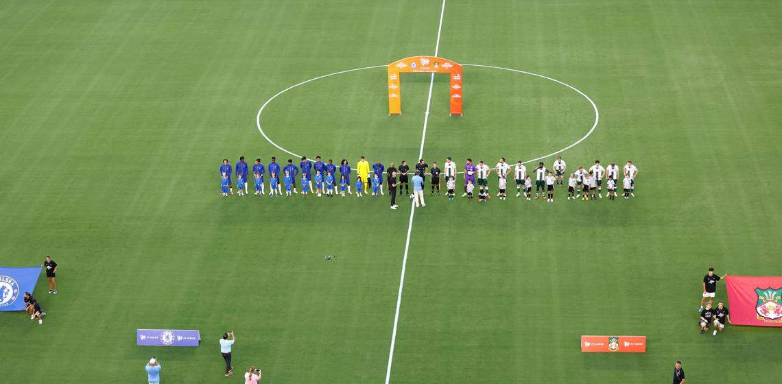 Chelsea and Wrexham players line up before Chelsea Football Club’s friendly match against Wrexham AFC at Kenan Stadium in Chapel Hill, N.C., Wednesday, July 19, 2023.