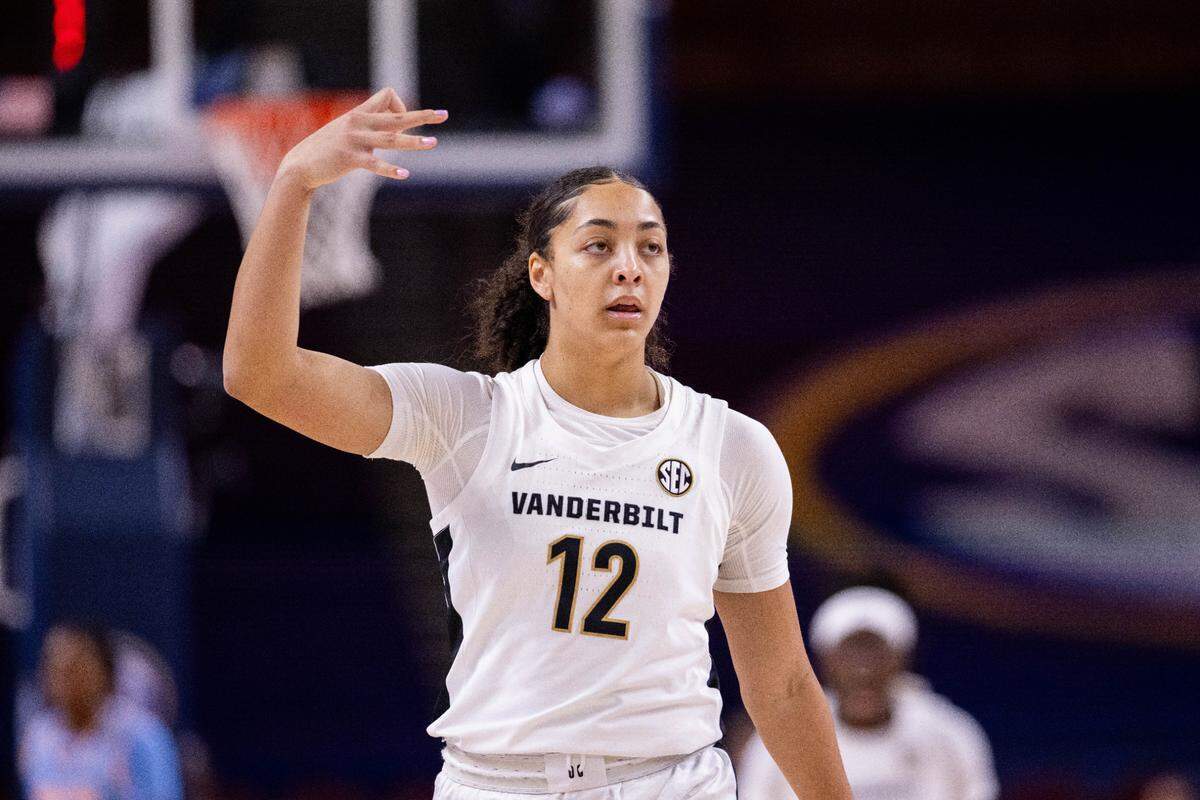 Mar 6, 2025; Greenville, SC, USA; Vanderbilt Commodores forward Khamil Pierre (12) celebrates a three against the Tennessee Lady Vols during the first half at Bon Secours Wellness Arena. Mandatory Credit: Scott Kinser-Imagn Images